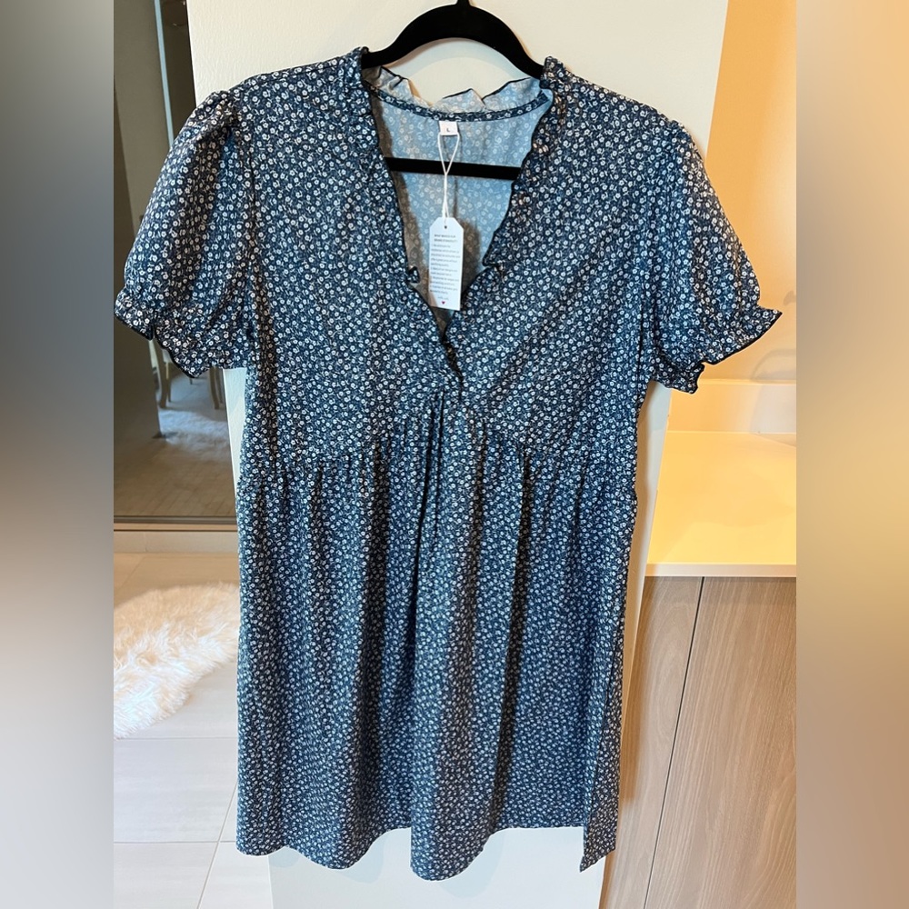 Navy ditsy floral baby doll dress. Size Large. Never worn.